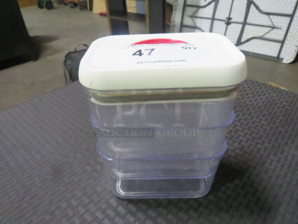 One Lot Of Storage Containers.