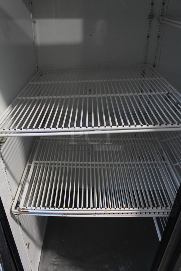 2012 True TG2R-2S ENERGY STAR Stainless Steel Commercial 2 Door Reach In Cooler w/ Poly Coated Racks on Commercial Casters. 115 Volts, 1 Phase. Tested and Working! - Image 2 of 4