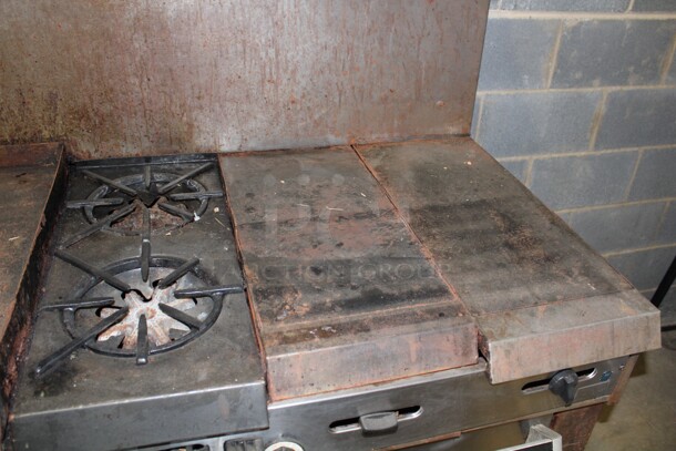 WOW! Garland 2 Burner Natural Gas Range With Griddle, 2 Full Size Ovens, Backsplash And Salamander Shelf. 75x31x59. Working When Pulled! - Image 3 of 6