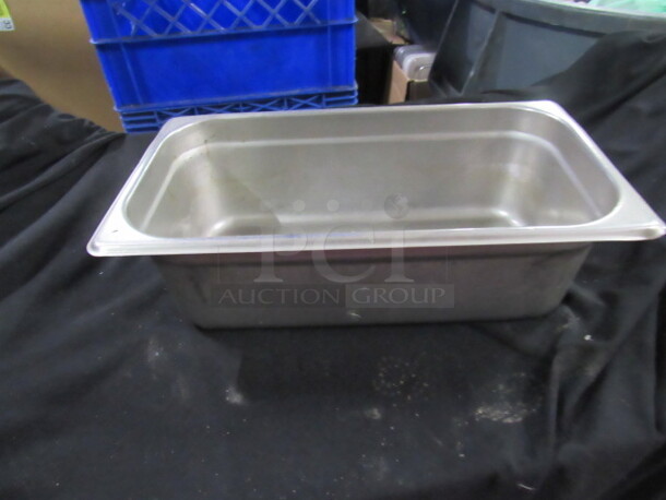 One 1/3 Size 4 Inch Deep Hotel Pan. 