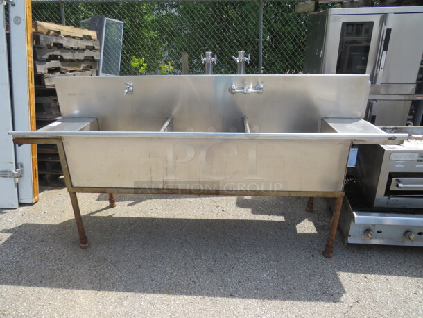 One Stainless Steel 3 Compartment Sink With R/L Drain Board And 2 Faucets. - Item #1112459