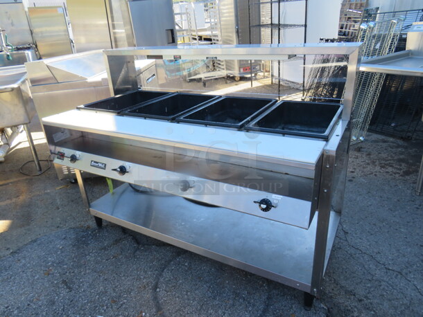 One Serve Well 4 Well Steam Table With Under Shelf, Over Shelf, And Cutting Board. Model# 38104. 120 Volt. 61X33X47.5. $2323.40. - Image 2 of 2