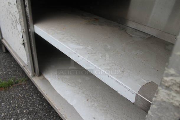 BRAND NEW SCRATCH AND DENT! Stainless Steel Commercial Table w/ 2 Doors, Back Splash and Under Shelf. - Image 4 of 5