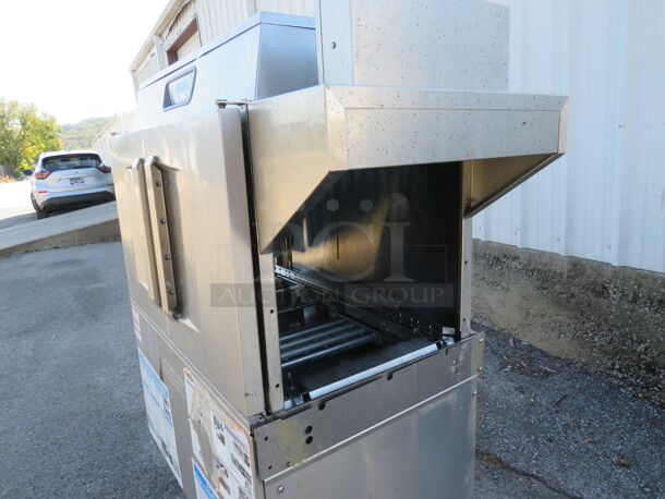 One WORKING Hobart Conveyor High Temp Dishwasher. Model# CL44ENER. 208 Volt 3 Phase. 58X31.5X80. $39,190.69.  - Image 4 of 4