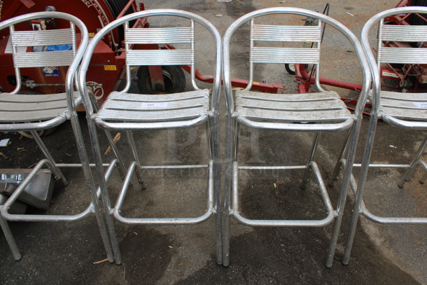 2 Metal Bar Height Chairs w/ Arm Rests. Stock Picture - Cosmetic Condition May Vary. 20x21x40. 2 Times Your Bid!