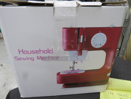 One NEW Sewing Machine.