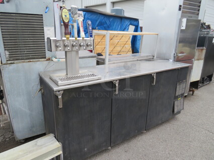 One Glas Tender 3 Door Keg Box With 5 Taps And Handles. Model# BB84-RI-BSH. 120 Volt. 84X25X55. WORKS GREAT.