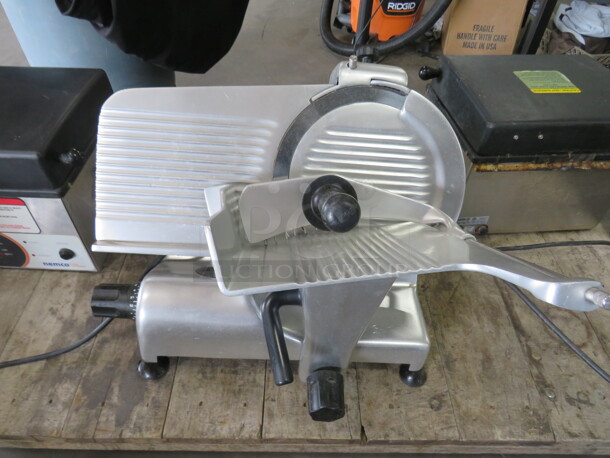 One Globe Deli Slicer. 115 Volt. Model# G12 - Image 1 of 3