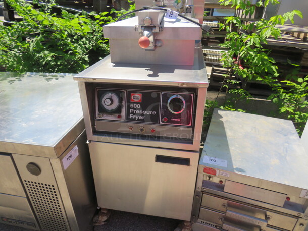 One Henny Penny Natural Gas Pressure Fryer On Casters. #600. 18X40X49. - Image 2 of 3