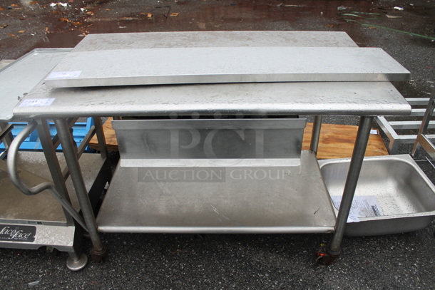 Stainless Steel Table w/ Drawer and Under Shelf on Commercial Casters.