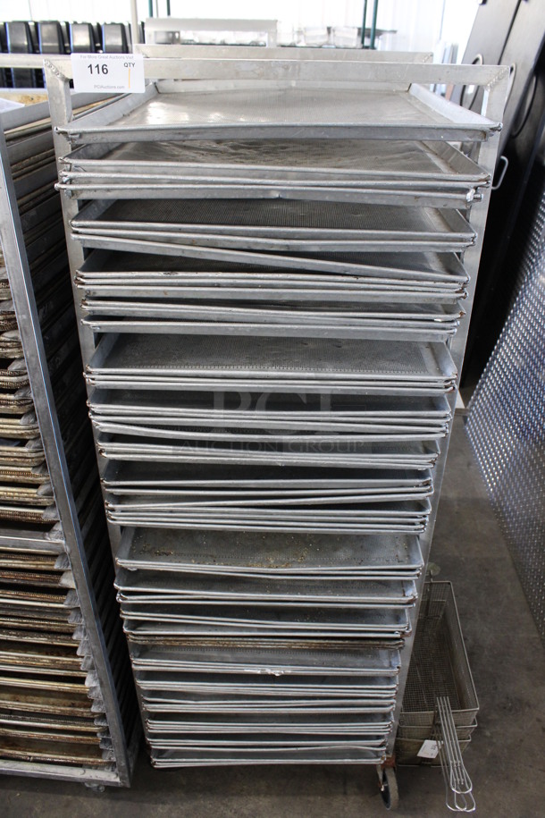 Metal Commercial Pan Transport Rack w/ 64 Baking Pans on Commercial Casters. 25.5x23.5x69. Baking Pans 23x28x1
