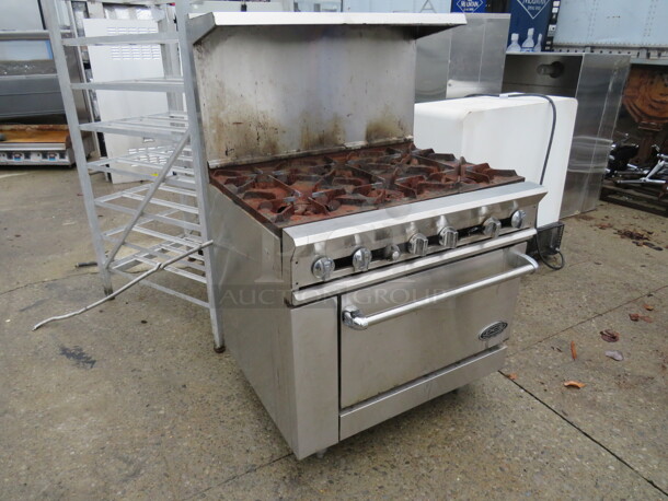 One DCS Natural Gas 6 Burner Range With SS Over Shelf. 36X33X56 - Image 2 of 2