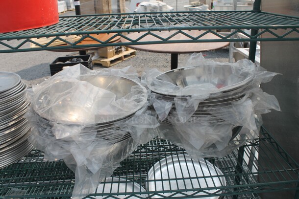 ALL ONE MONEY! Lot of Items Including Metro Shelf With Red Salad Spinner, Aluminum/Steel Plates And Bowls. BUYER MUST DISMANTLE. PCI CANNOT DISMANTLE FOR SHIPPING. PLEASE CONSIDER FREIGHT CHARGES. - Image 4 of 5