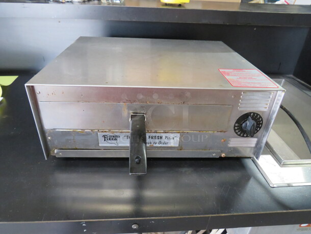 One Wisco Pizza Oven. Model# 412-4. 120 Volt. 1720 Watt. 18X15X7.5 - Image 1 of 2