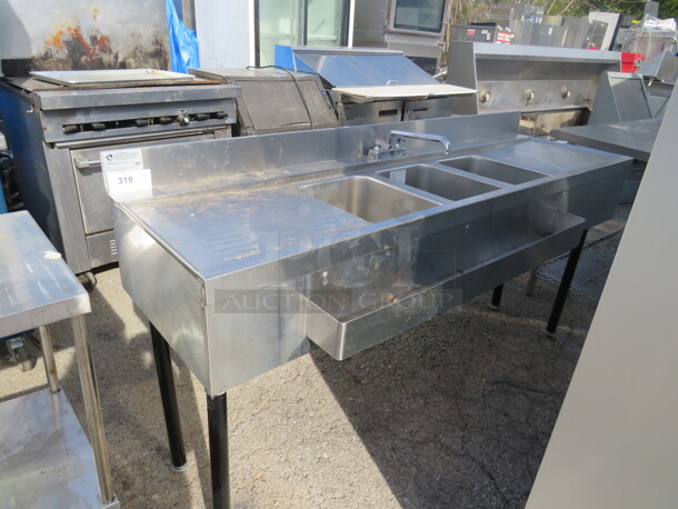 One Stainless Steel 3 Compartment Sink With Faucet, R/L Drain Board, 41 Inch Bottle Rail Attached. 71X26X38.5 - Image 1 of 2