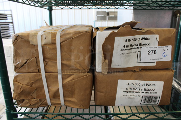 6 BRAND NEW! Bundles of White Paper Bags. 5x3.25x9.75. 6 Times Your Bid!