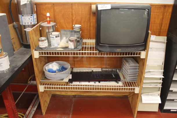 Shelving Unit w/ Contents Including  Television. - Image 1 of 3
