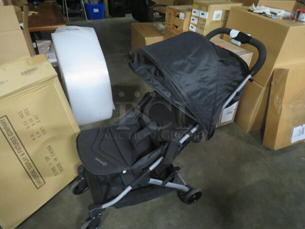 One NEW Safety 1St Stroller. 