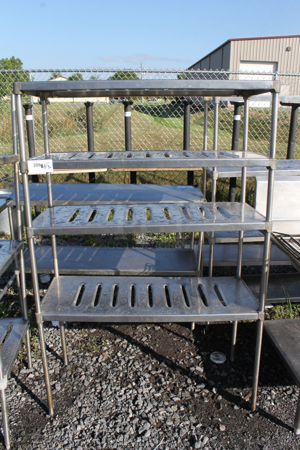 Metal 4 Tier Shelving Unit. BUYER MUST DISMANTLE. PCI CANNOT DISMANTLE FOR SHIPPING. PLEASE CONSIDER FREIGHT CHARGES. - Image 1 of 3