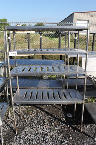 Metal 4 Tier Shelving Unit. BUYER MUST DISMANTLE. PCI CANNOT DISMANTLE FOR SHIPPING. PLEASE CONSIDER FREIGHT CHARGES.