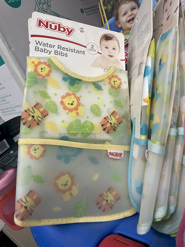 MASSIVE LOT! (3) Little Tikes 2-In-1 Snug & Secure Swings – 1 Blue, 2 Pink; (17) Nuby Water Resistant Baby Bibs (assorted colors); (1) Graco “Caden Fashion” Comfy Cruiser™ Travel System With Snugride® 30; (1) Allen YOOGO CZ2 Convertible Cargo Trailer → Handy Pull Cart,  (1) Delta Children Sweet Slumber Bassinet, (1) Chicco LullaGo Portable Bassinet, (1) Chicco NextFit Sport Convertible Car Seat, (2) Evenflo Omni Plus Modular Travel System – Includes LITEMAX Rear-Facing Infant Car Seat, (1) Baby Trend EZ Ride Girl 35 - Includes NEW 4-35 Ibs Infant Car Seat , (1) Evenflo Nurture Infant Car Seat Base. 11x Your Bid - Image 3 of 12