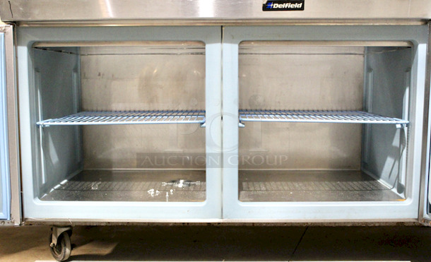 NICE! Delfield  70” PTB Pizza Prep Table With Mega Top, Self Contained Refrigerated Base With 27.12” DP, Bloomington Cold Rail & Template.
Tested - In Working Order.
115v/60hz/1ph/12.0A   - Image 2 of 7