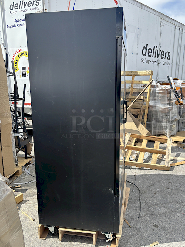 BRAND NEW SCRATCH & DENT! Avantco GDC-49F-HC 53" Black Swing Glass Door Merchandiser Freezer with LED Lighting. SN: 549884687. 115v Missing Power Cord. 53 1/8 x 31 7/8 x 83 7/8 Inches

 - Image 5 of 5