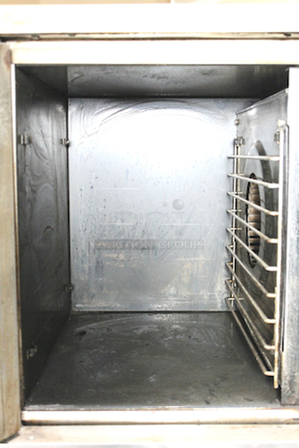 Garland MCO-ES-20-S Double Deck Standard Depth Full Size Electric Convection Oven - 208V, 1 Phase, 20.8 kW On Equipment Stand With Undershelf and Commercial Casters. 36x44x74                     

Not Tested.  - Image 2 of 7