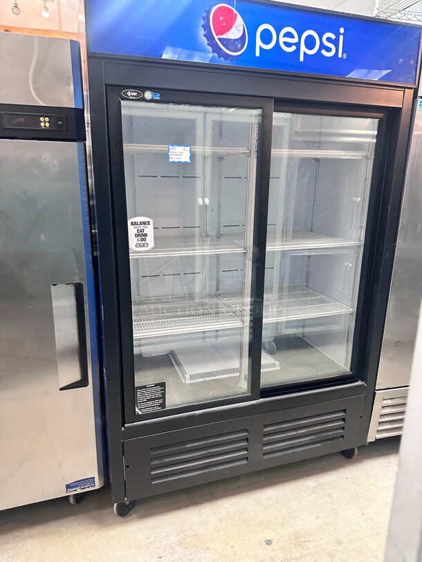 Late Model QBD CD45 Sliding 2 Door Upright Pop Juice Fridge Cooler 40 CuFt 115 Volt Tested and Working - Image 1 of 7