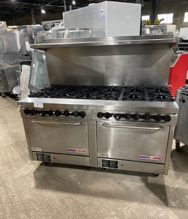 Southbend Commercial Natural Gas Powered 12 Burner Stove! With Raised Back Splash And Salamander Shelf! With 2 Full Size Oven Underneath! All Stainless Steel! On Casters! Working When Removed! - Image 1 of 12