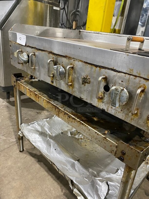 GREAT! Star Commercial Natural Gas Powered Flat Griddle! On Equipment Stand! With Back & Side Splashes! With Underneath Storage Space! With Weighted Wood Handle Meat/Hamburger Press! On Legs! WORKING WHEN REMOVED! - Image 7 of 8