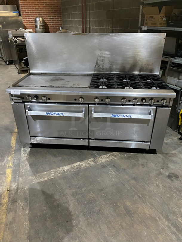 SWEET! Imperial Commercial Natural Gas Powered 6 Burner Stove With Left Side Flat Top Griddle! 2 Full Size Ovens Underneath! With Metal Oven Racks! Left Side Splash And Raised Back Splash! All Stainless Steel! On Casters!