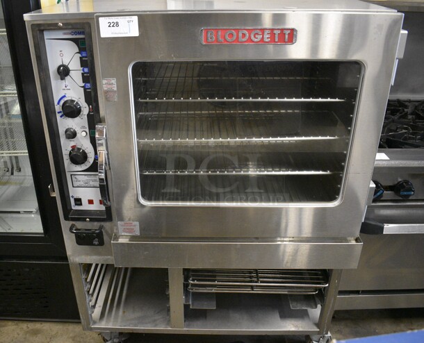 Blodgett Model BC14E/AB Stainless Steel Commercial Electric Powered Convection Oven w/ View Through Doors, Metal Oven Racks and Lower Pan Rack on Commercial Casters. 208 Volts, 3 Phase. 41x39x56
