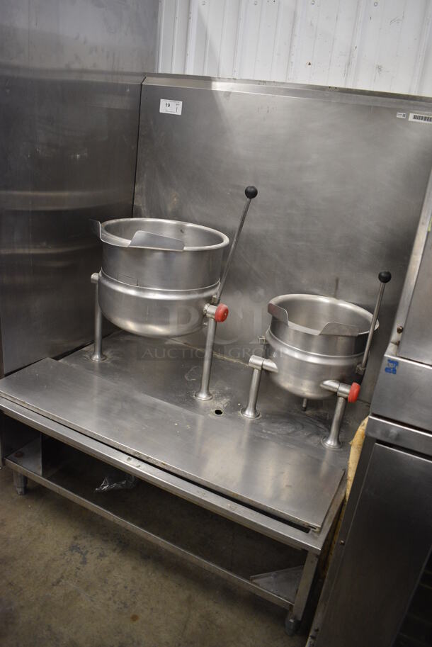 Cleveland Stainless Steel Commercial Floor Style Steam Powered Double Tilting Kettle Station w/ KDT-12T 12 Gallon Kettle and KDT-6T 6 Gallon Kettle. 47x35x62