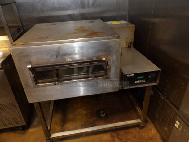 Lincoln Enodis Stainless Express Conveyor Pizza Oven on Wheels, Natural Gas, Single Deck, Single Conveyor, Front Load TESTED AND WORKING  - Image 3 of 5