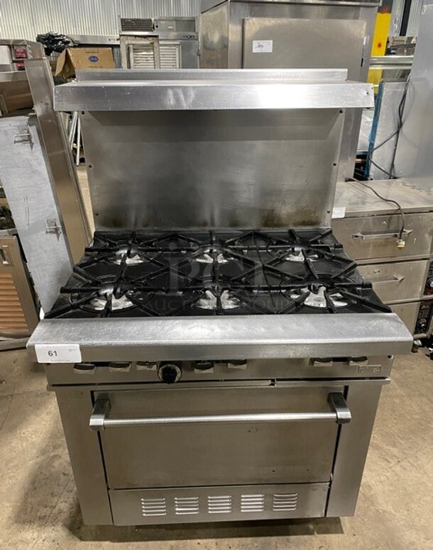 Garland Stainless Steel 6 Burner Stove With Oven Underneath! Natural Gas Powered! With Raised Back Splash And Salamander Shelf!  On Legs!