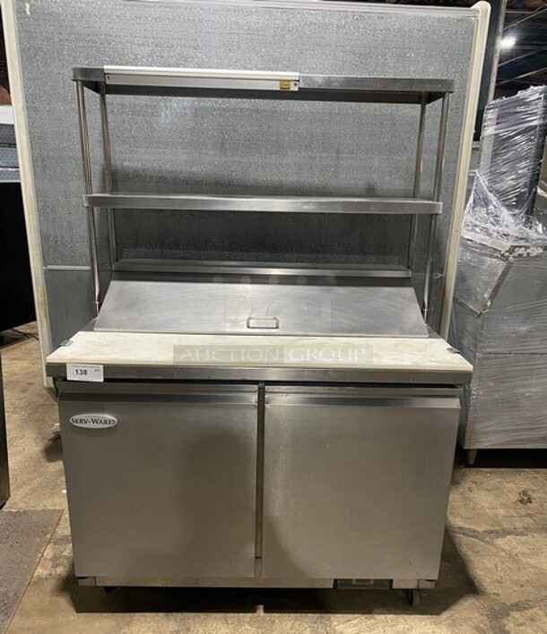 2021 Serv-Ware Prep Table With Commercial Cutting Board And 2 Doors Underneath!  w/ 2 Tier Over Shelf on Commercial Casters! Working When Removed! MODEL SP4812HC SN:21032106 