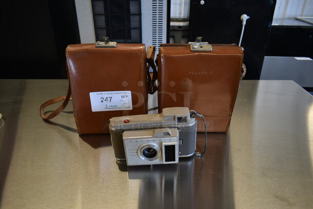 Polaroid J33 Land Camera w/ 2 Brown Cases.