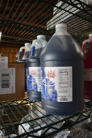6 BRAND NEW SCRATCH AND DENT! Jugs; 3 999SNOCHERY Carnival King 1 Gallon Cherry Snow Cone Syrup and 3 999SLBLRASP Carnival King 1 Gallon Blue Raspberry Slushy 5:1 Concentrate. 6 Times Your Bid!