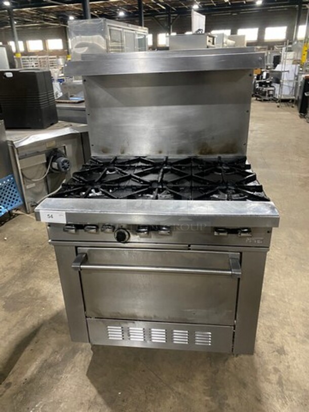 Garland Commercial Natural Gas Powered 6 Burner Stove! With Raised Back Splash And Salamander Shelf! With Oven Underneath! All Stainless Steel! On Legs!