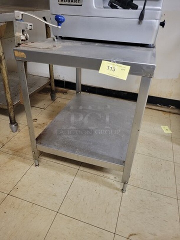 Stainless Steel Work Table w/ Can Opener

*Contents on top of table not included! - Image 1 of 2