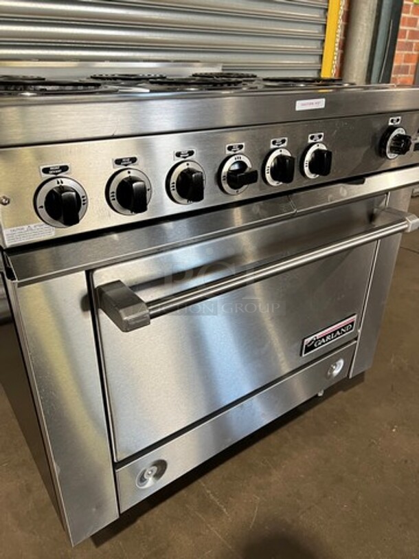 WOW! NEW OUT OF THE BOX! NEVER USED! Garland Heavy Duty Commercial Electric Powered 6 Burner Range With Full Size Convection Oven Underneath! All Stainless Steel Body! With Oven Racks! Model 36ER33 - Image 5 of 9
