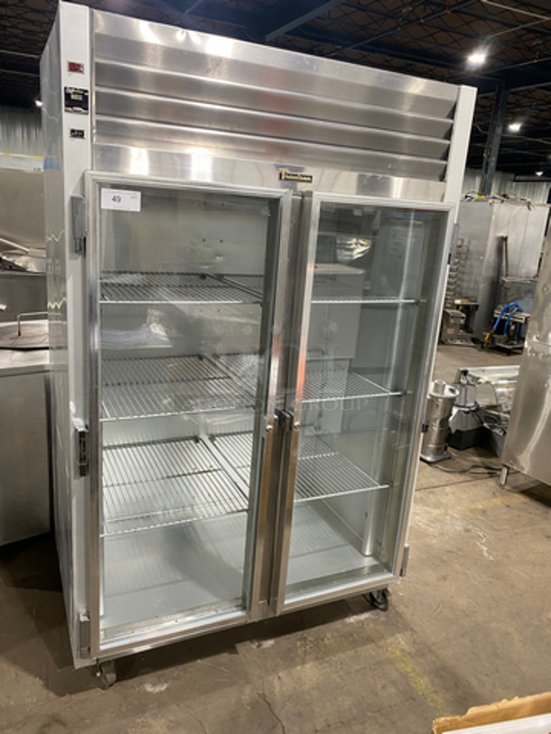 Traulsen Commercial 2 Door Reach In Cooler! With View Through Doors! Poly Coated Racks! Stainless Steel! On Casters! WORKING WHEN REMOVED! Model: GZ1010 SN: T798680I97 115V 60HZ 1 Phase