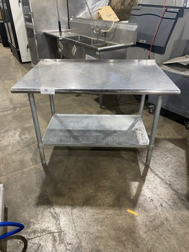 Solid Stainless Steel Work Top/ Prep Table! With Back Splash! With Storage Space Underneath! On Legs!
