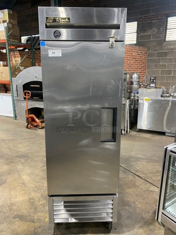 True Single Door Reach-In Freezer! With Poly Coated Racks! Solid Stainless Steel! On Casters! Model: T23F SN: 7713908 115V 60HZ 1 Phase