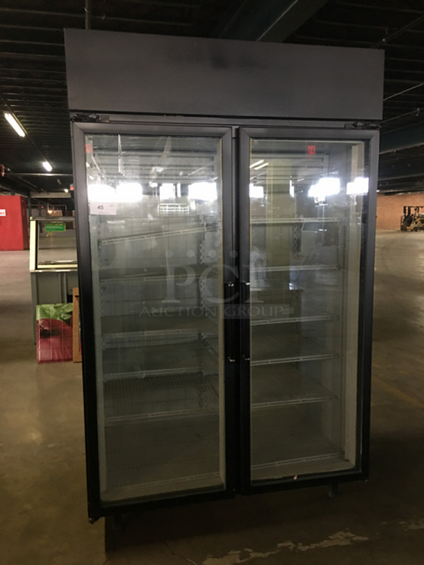 Commercial Freezer 2 Door Reach In Display Case Merchandiser! With View Through Doors! With Poly Coated Racks! On Legs! Model: T50LGPCA4 SN: 81252725 115/208/230V 60HZ 1 Phase