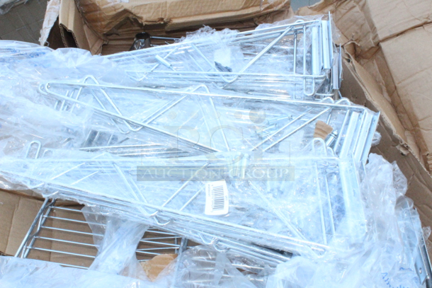 BRAND NEW SCRATCH & DENT! Regency 14" x 60" Chrome Wire Wall Mount Shelf W/ Mounting Bracket Kits. Packaging is damaged. (2) Wire Shelf, (6) Mounting Kits. Some small pieces may be missing.   - Image 3 of 4