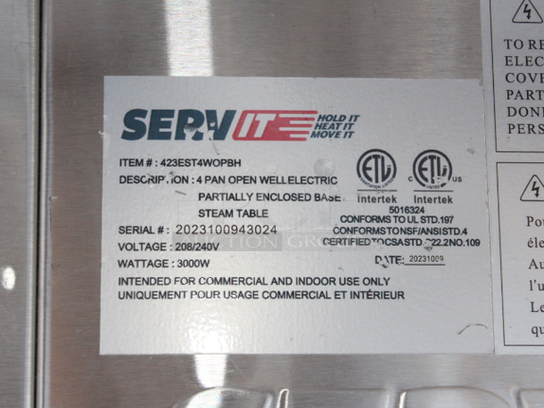 BRAND NEW SCRATCH & DENT! ServIt Four Pan Open Well Electric Steam Table with Partially Enclosed Base - 208/240V, 3000W. SERIAL #: 2023100943024 Out of original packaging. Partially enclosed base in missing two panels.  - Image 3 of 3