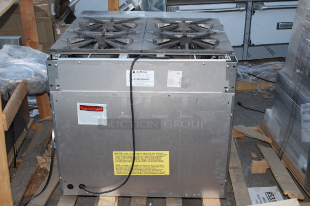 BRAND NEW SCRATCH & DENT! Garland / U.S. Range MST44S-E NAT Master Sentry Series Natural Gas 4 Burner 34" Range with Storage Base - 140,000 BTU. FEATURES: Electric ignition & flame fail on all burners *Thumbnail photo is shown with oven base please see additional photos. 	 - Image 5 of 6