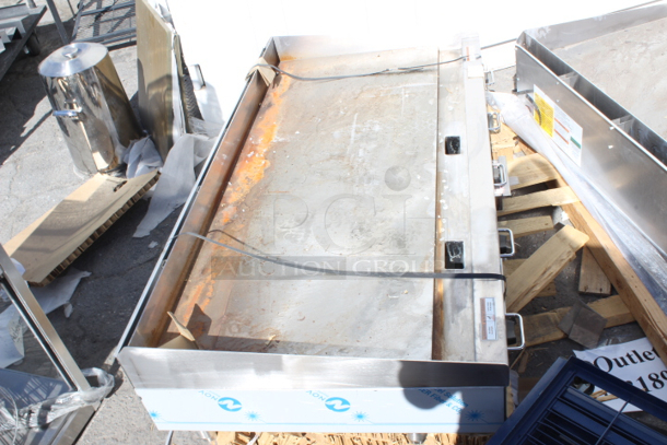 BRAND NEW SCRATCH & DENT! Wolf by Vulcan AGM60-NAT Natural Gas 60" Heavy-Duty Gas Countertop Griddle with Manual Controls - 135,000 BTU. Unit has surface rust and very minor denting.  - Image 3 of 4